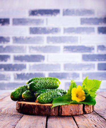Cucumber on wooden board and vintage background.の写真素材
