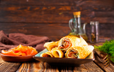 Pancakes with fish salmon, cheese and dill.の写真素材
