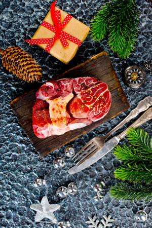 A few steak pieces on the wooden boardの写真素材