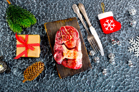 A few steak pieces on the wooden boardの写真素材