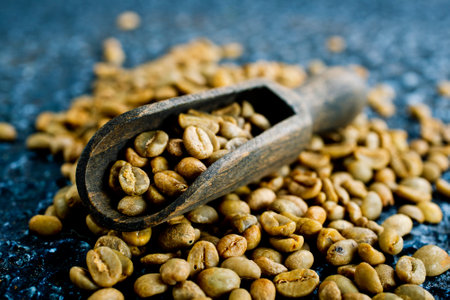 Green coffee on dark backgroundの写真素材