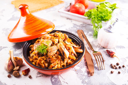 stew cabbage with fried meat in bowlの写真素材