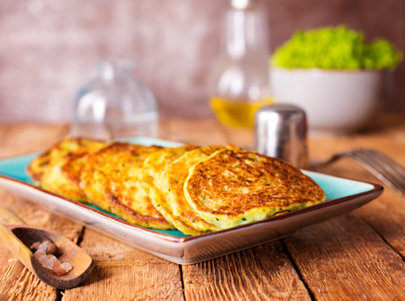 Close up view of vegetable pancakes on plateの写真素材