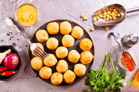 Falafel (Middle East): Deep-fried balls made from ground chickpeas with tahini sauce.の写真素材