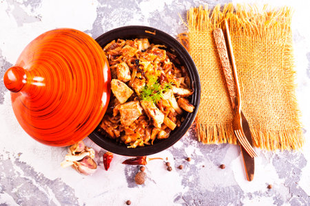 Bigos, a traditional Polish dish with cabbage, cabbage with meat in tajinの写真素材