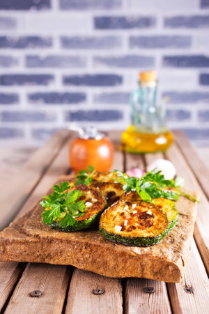 Homemade Oven Roasted Zucchini Slices with Garlicの写真素材
