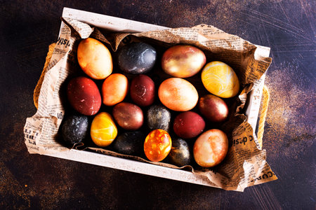 color easter eggs on dark table