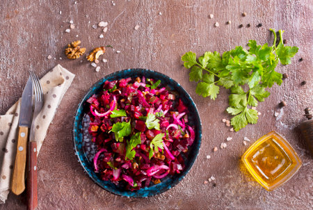 Traditional Russian vegan salad with potato and beetroot in bowlの写真素材