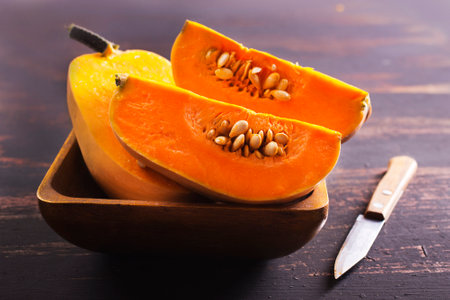 Orange pumpkins on a table.の写真素材