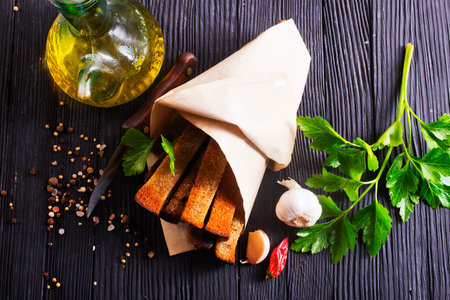 Pieces of dry bread. rye bread croutons beer appetizer, garlic rye croutonsの写真素材