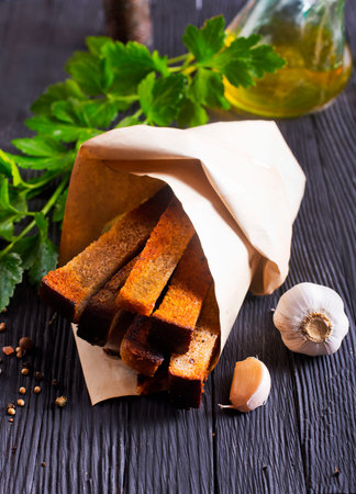 Pieces of dry bread. rye bread croutons beer appetizer, garlic rye croutonsの写真素材