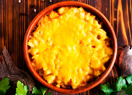 baked potatoes with cream and cheeseの写真素材