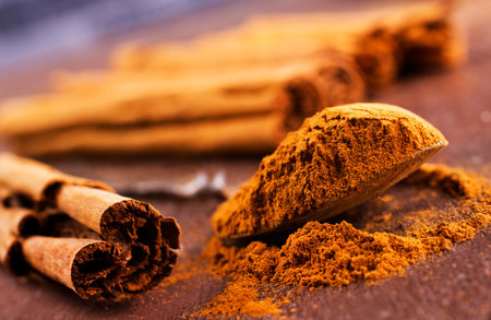 cinnamon powder on a table, aroma spice