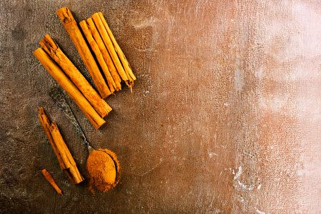 cinnamon powder on a table, aroma spice