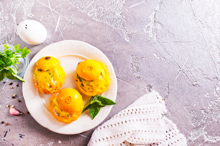 Baked pattypan squash, stuffed with cheese,の写真素材