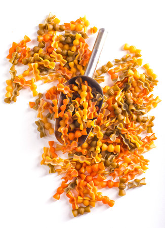 Colorful pasta on white background. Copy space included.の写真素材