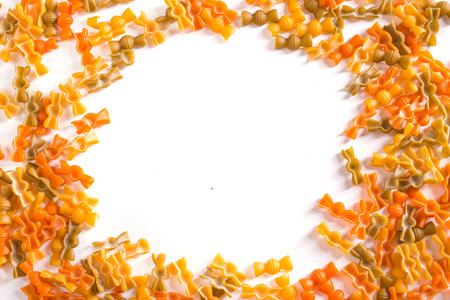 Colorful pasta on white background. Copy space included.の写真素材