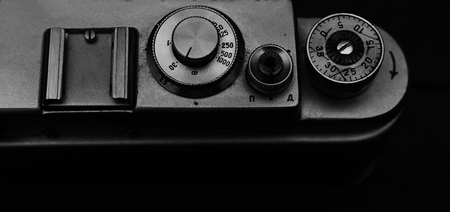 Old camera details closeup on dark backgroundの写真素材