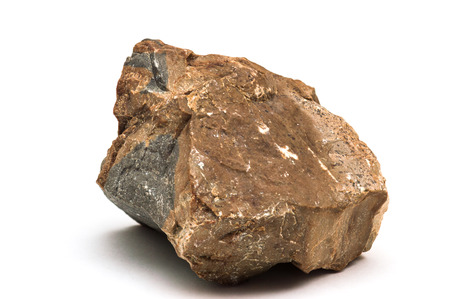 Piece of rock isolated on white backgroundの写真素材