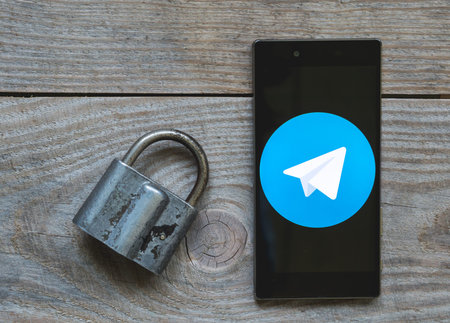 MOSCOW, RUSSIA, April 17, 2018. Icon of the popular messenger Telegram on the smartphone screen with...