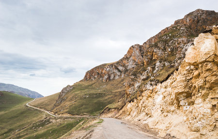Narrow road in the mountains running into the settlement of Khinalig, Azerbaijan