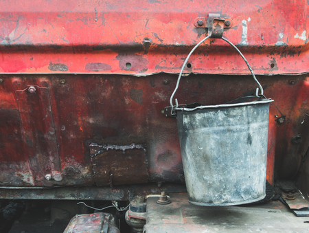 Metal suspended bucket on construction vehiclesの写真素材