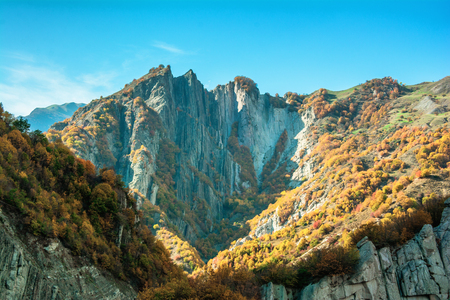 Incredible landscape - view of the mountain range with yellowed trees and gorgesの写真素材