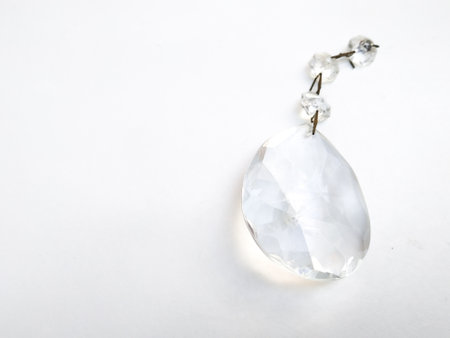 Transparent jewel with chain on white backgroundの写真素材