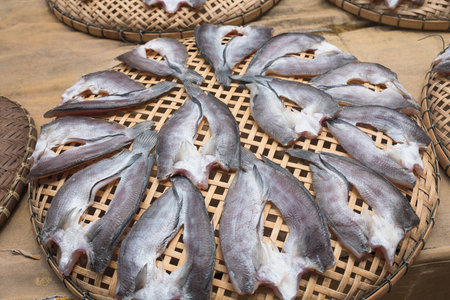 Fish, dried on. On a bamboo basket