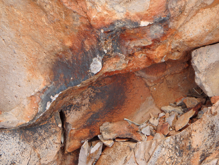 Natural abstract rock colored by desert varnish. Found on Apache Trail west of Roosevelt Lake in Arizona.の写真素材