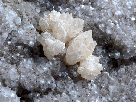 A natural abstract of white quartz crystals rock.の写真素材