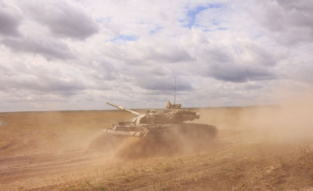 T-64BM Bulat tank rides on the fieldの写真素材