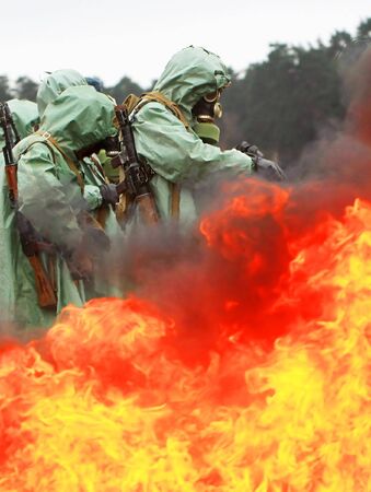  soldiers dress chemical protection suites.の写真素材