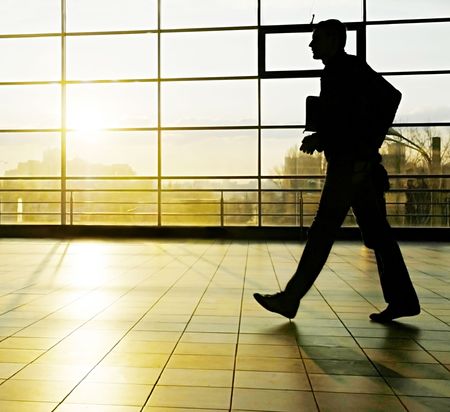 Bussinesman walking  in a futuristic tunnel                                     の写真素材