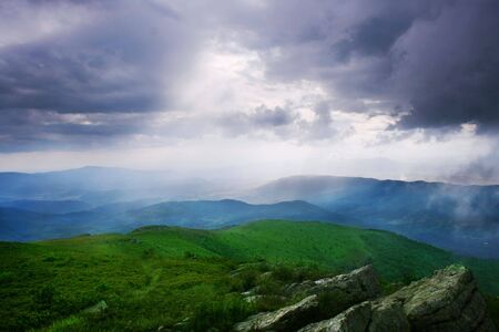 Sun rays through the cloudy sky. Carpathian Mountainsの写真素材