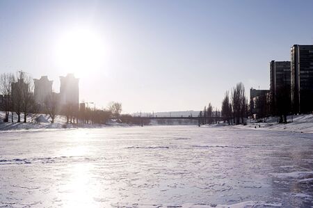 Frozen river in the sunshine dayの写真素材