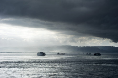 Ferry from Java to Bali under the storm. Indonesiaの写真素材