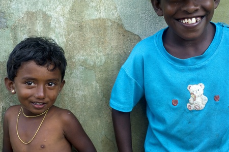 Neluwa; Sri Lanka - January 27; 2011: Portrait of a littlel Sri Lankan girl  from small village in Sinharaja Rain Forest. Sinharaja Rain Forest is the last viable area of primary tropical rainforest in Sri Lanka. The Rain Forest is a UNESCO World Natural のeditorial素材