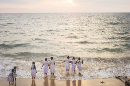 Colombo,Sri Lanka - February 22,2011: Sri Lankan schoolgirl after class having fun on the beach