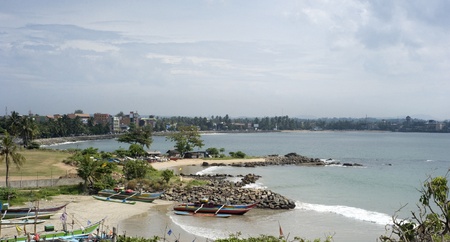 Skyline of Galle with beautiful beach and fishing boats. Sri Lankaの写真素材