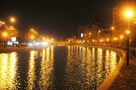 Bucharest, Romania - November 7, 2011: Dambovita river  in the center of Bucharest at night. Romaniaのeditorial素材