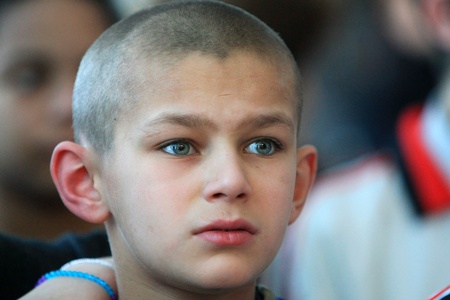 Kiev, Ukraine - February 21, 2008: Unidentified boy at Shelter for Minors. Of Ukraines nine million children some 65,000 live in state-run childrens institutions such as orphanages, boarding schools and shelters.のeditorial素材