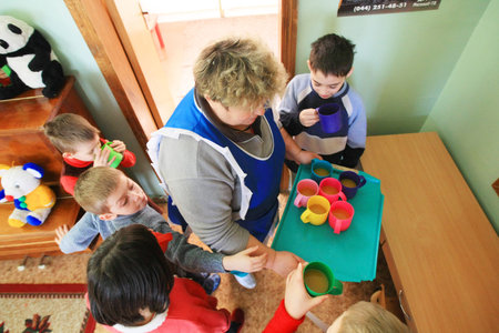 Kiev, Ukraine - February 21, 2008: Children at Shelter for Minors. Of Ukraines nine million children some 65,000 live in state-run childrens institutions such as orphanages, boarding schools and shelters.のeditorial素材