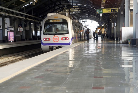 Delhi, India - March 03, 2012: Delhi Metro station in Delhi. Delhi Metro network consists of six lines with a total length of 189.63 kilometres (117.83 mi) with 142 stations Delhi, India - March 03, 2012: Delhi Metro station in Delhi. Delhi Metro network consists of six lines with a total length of 189.63 kilometres (117.83 mi) with 142 stations
