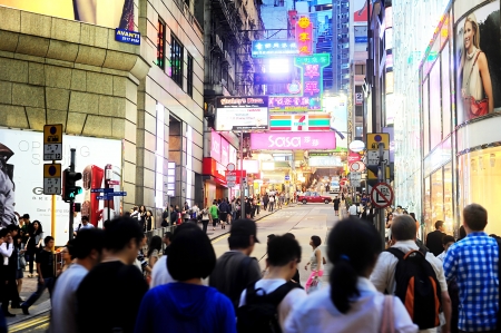 Hong Kong - May 21, 2012: Crowded Hong Kong street. With a land mass of 1,104 km and population of 7 million people, Hong Kong is one of the most densely populated areas in the worldのeditorial素材