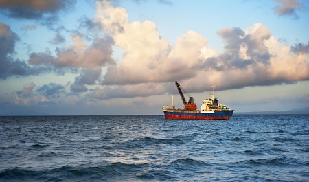 Ship at sunset in the ocean. Philippinesの写真素材