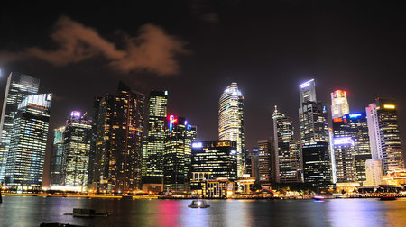  Singapore - March 05, 2013:  Night panorama of Singapore downtown. There are more than 7,000...