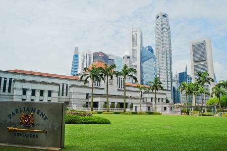 Singapore Parliament builading in front of Singapore downtownのeditorial素材