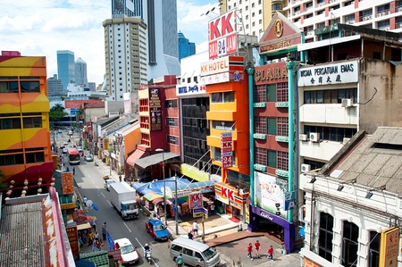 Kuala Lumpur, Malaysia -  May 11, 2013: People walking on Chinatown street in Kuala Lumpur. KL is the capital and most populous city in Malaysia. Covers an area of 243 km2 and has population of 1.6 million in 2012のeditorial素材
