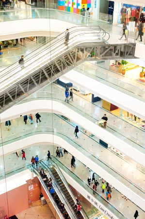 Hong Kong - January 15, 2013:  People walking and shopping at Times Square . Times Square is a major shopping centre and office tower complex Hong Kong. Consists of 83,700 m² of retail space, and two office towers with 102,300 m² of accommodation.のeditorial素材
